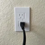 Self-closing outlet covers
